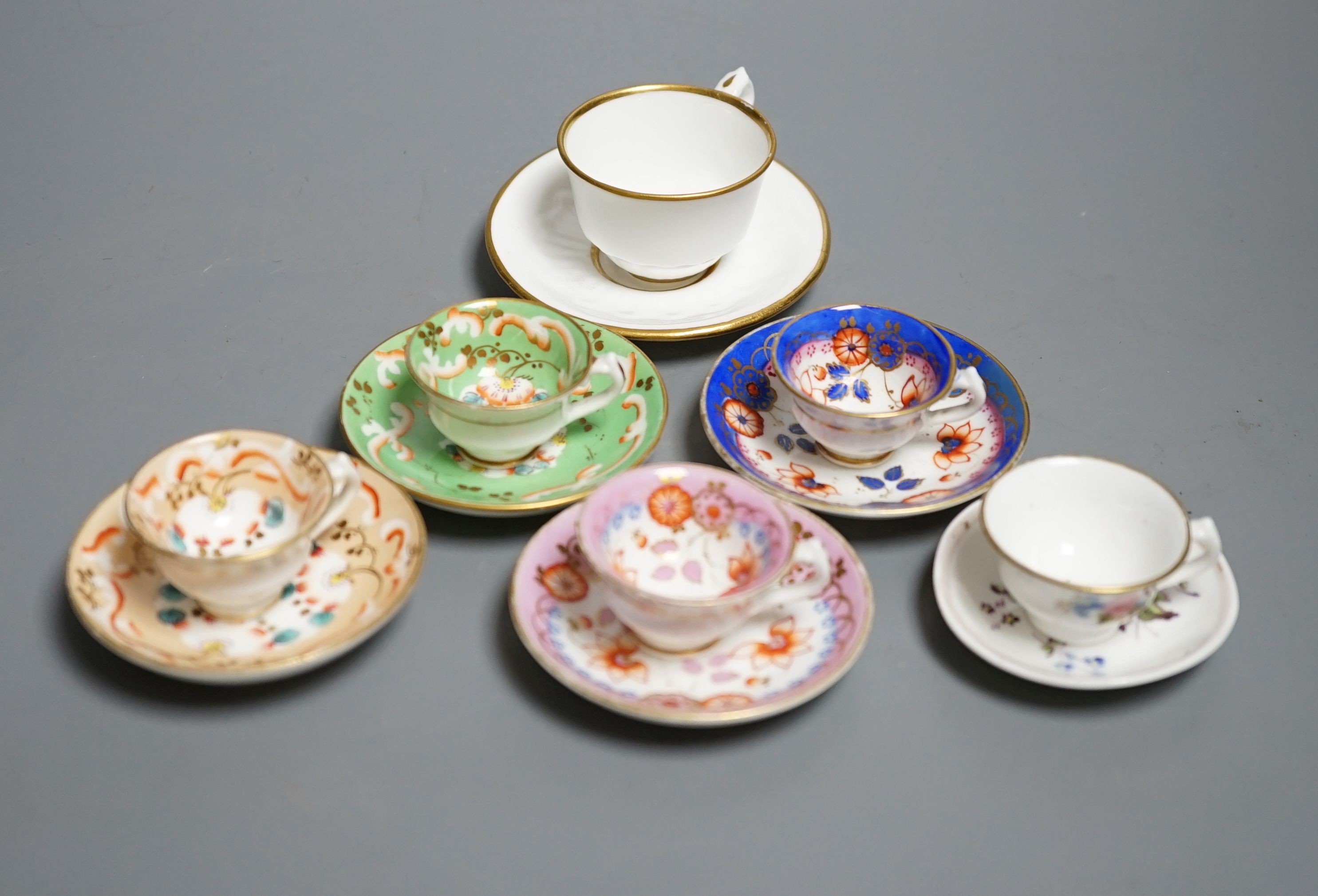 Five Staffordshire miniature teacups and saucers, possibly Alcock and a Hicks & Meigh miniture teacup and saucer, c. 1820. Provenance - Mona Sattin collection of miniature cups and saucers, collection no.s 135, 138-141,